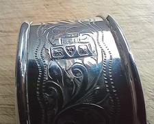 Solid silver Rolason Brothers Chester 1908 ornate napkin ring.