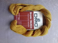 a hank of DMC Broder Medicis golden yellow colour 100% wool yarn, never used