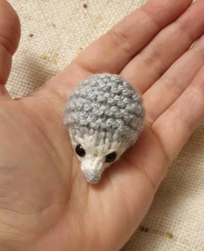 Hand knitted baby - hedgehog,