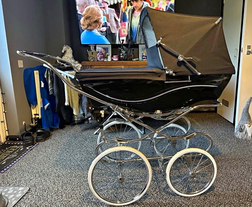 Silver cross black pram with - cross,