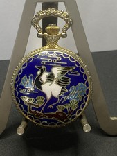 Enamel Quartz Pocket Watch  Featuring A Crane On A Cobalt Blue background. PW5