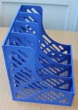 Four Blue Plastic Magazine File Holder Rack in Good Condition.