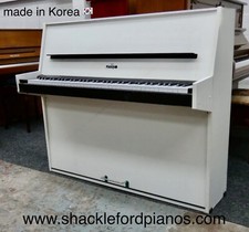 Opus Pianino  Piano in white finish with black trim - compact design
