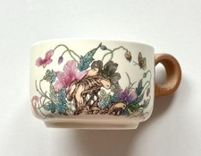 A set of 2 ceramic flower pattern 180 ml light yellow tea cup with wooden handle