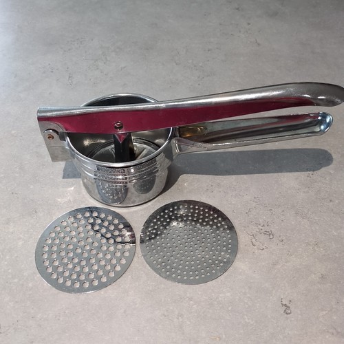 Potato ricer with - potato,