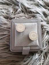 A pair of Mulberry button