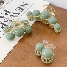 Dazzle with this Unique set of three hair clips featuring elegant designs