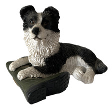 Border Collie Dog Figurine resting on a Wellington boot REGENCY FINE ARTS