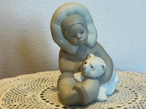 Lladro eskimo playing - ",