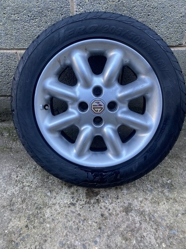 Genuine 8 spoke alloy - mg,