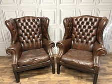 2 antique brown leather chesterfield Queen Anne high back chairs CAN DELIVER ?