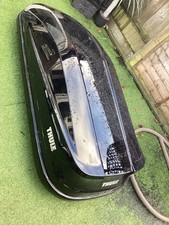 Thule  Roof box Motion gloss black quick grip