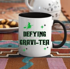 Defying Gravi-Tea Mug Wicked 11oz Green Black White Musical Wicked Witch Mugs