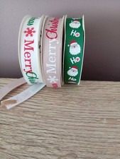  3 reels of assorted christmas ribbons + 1 wired merry christmas ribbon