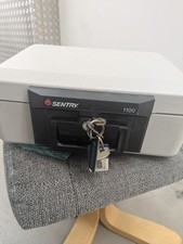 Sentry 1100 Fire Proof Safe. 15x11x6 Inches With Key. In Good Condition.