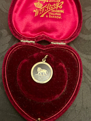 Antique silver lion medal - silver,
