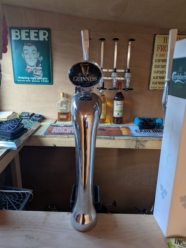 Guinness beer pump - full, bar