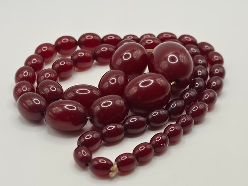 Cherry red amber bakelite bead - cherry,