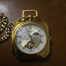 Beautiful Woodford Gold tone