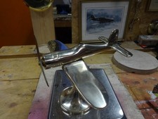 A Brass Model Aircraft.
