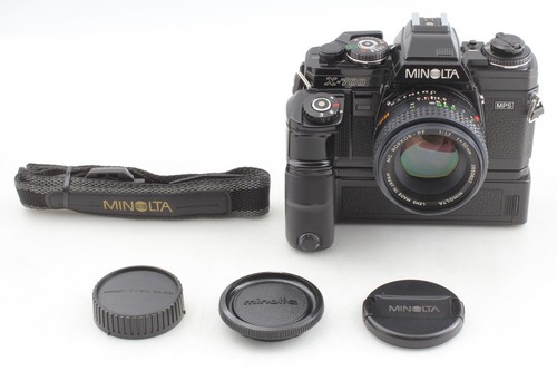 Mint minolta new - x-700, d