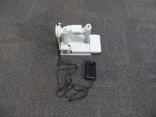 Vintage 1964 white singer - vintage,