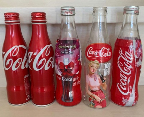 Cocacola empty bottles cans - bottles, &