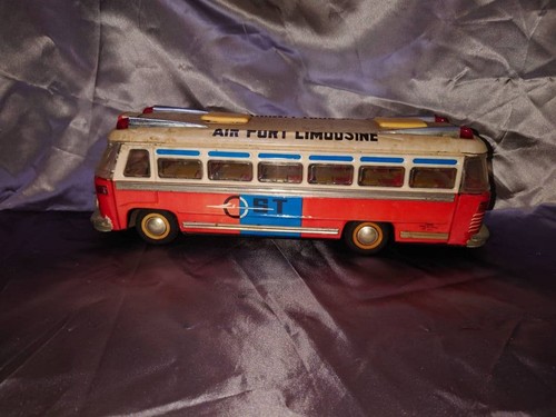 Antique tin toy with box