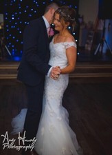 Benjamin Roberts size 12 Wedding Dress. Fitted, hidden corset. Lovely train.