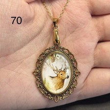 Stunning Stag Pendant Set In Decorative Bezel , Gold Plated Chain