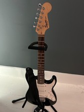 Squier Mini Fender Stratocaster - black in lightly used VGC with extras/case £80