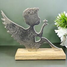 Silver Metal Angel On A Wood