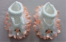 Hand knitted dolls clothes