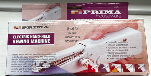 Hand held sewing machine - ,