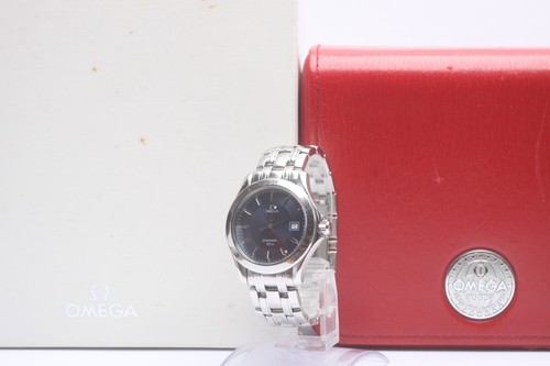 Near mint box omega - mint, w/box]
