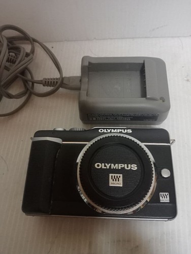 Olympus pl1 mirrorless - olympus,