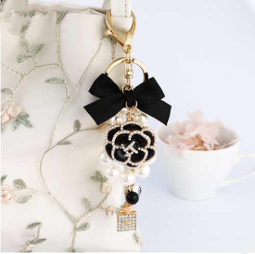 Keychain with pearl pendant - keychain,