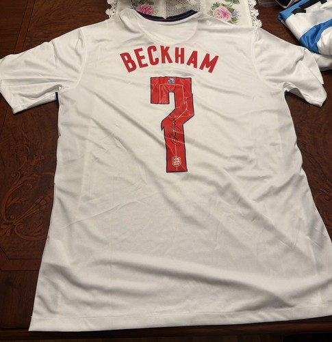 David beckham signed three - david,