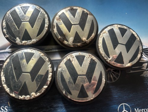 Five volkswagen wheel center - volkswagen,