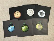 The Beatles solo   7" singles    Old records x 6  . Vinyl records.