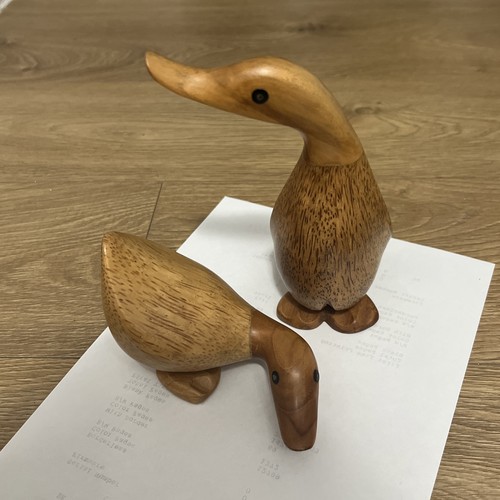 Pair hand carved wooden - of,