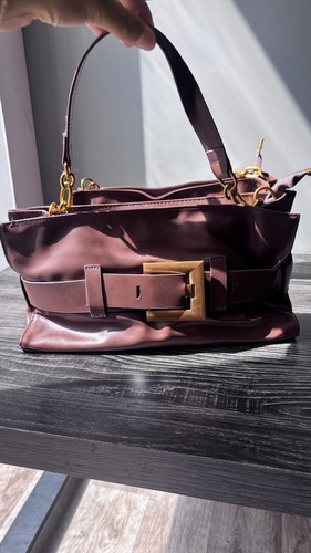 Brown hand bag - hand,