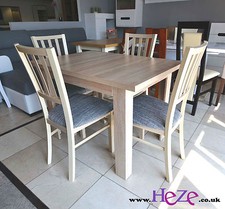 Extending dining table and 4