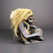 Tiki Tribal Man Playing Bongo