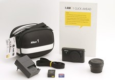 Nikon 1 J1 digital camera with accessories bundle