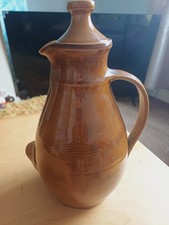 Woburn pottery decanter jug, tan,  with lid, very good condition
