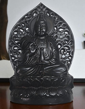 Guanyin Statue also Kwan Yin or Kuan Yin in sitting meditation posture.