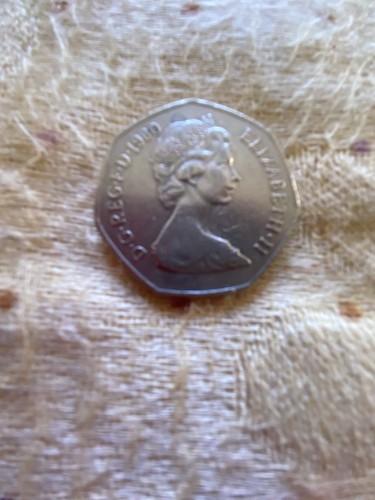 1980 50p coin has - has, been