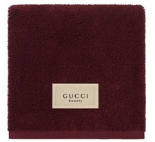 Gucci Beauty burgundy towel