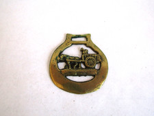 vintage brass horse pulling